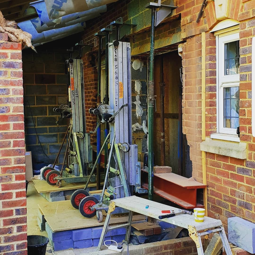 Steel supports going in at an extension opening by ADO Builders, Surrey