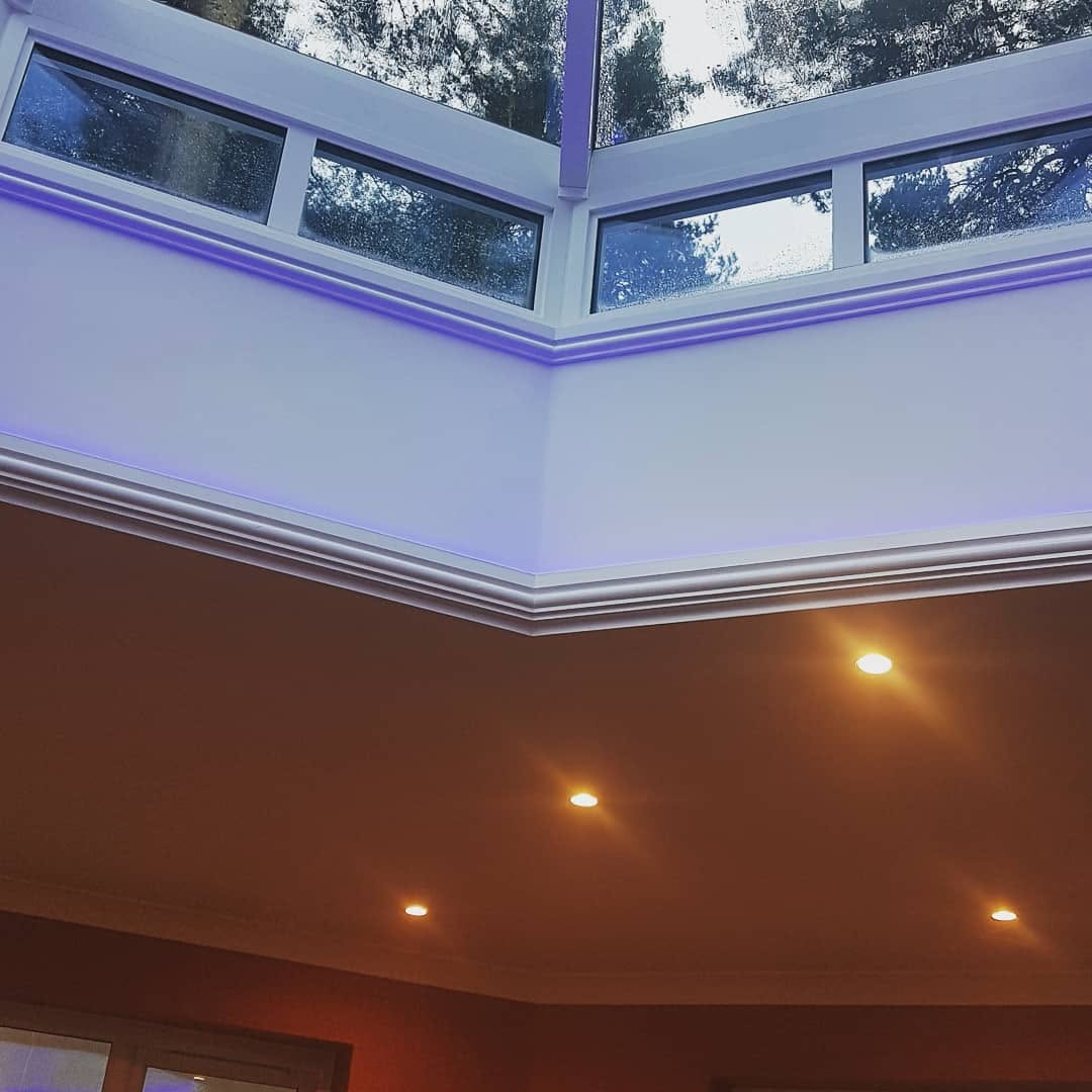 Extension roof lantern with colour-changing LED lighting by ADO Builders, Surrey