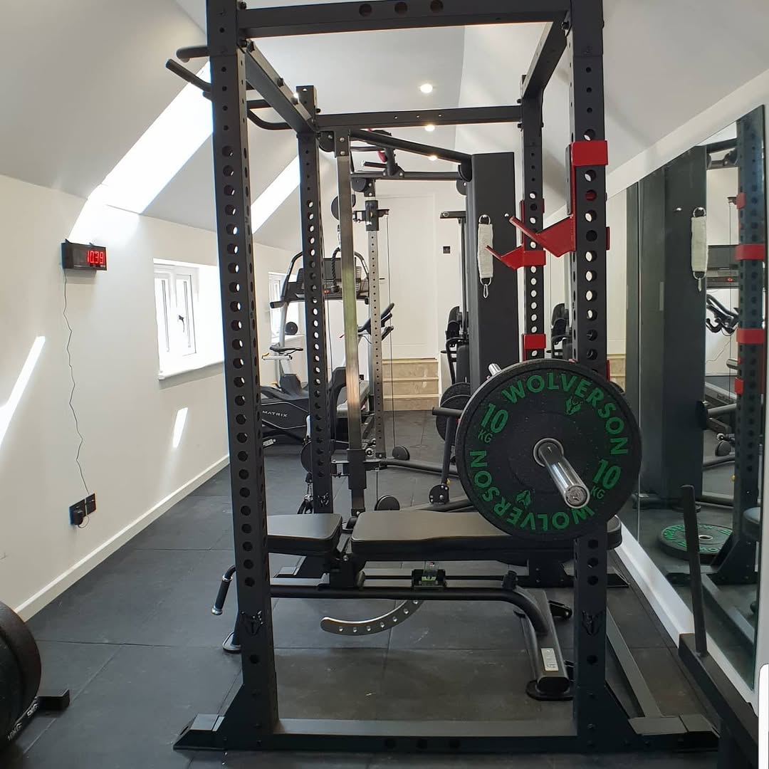 Garage converted into a home gym in Surrey by ADO Builders